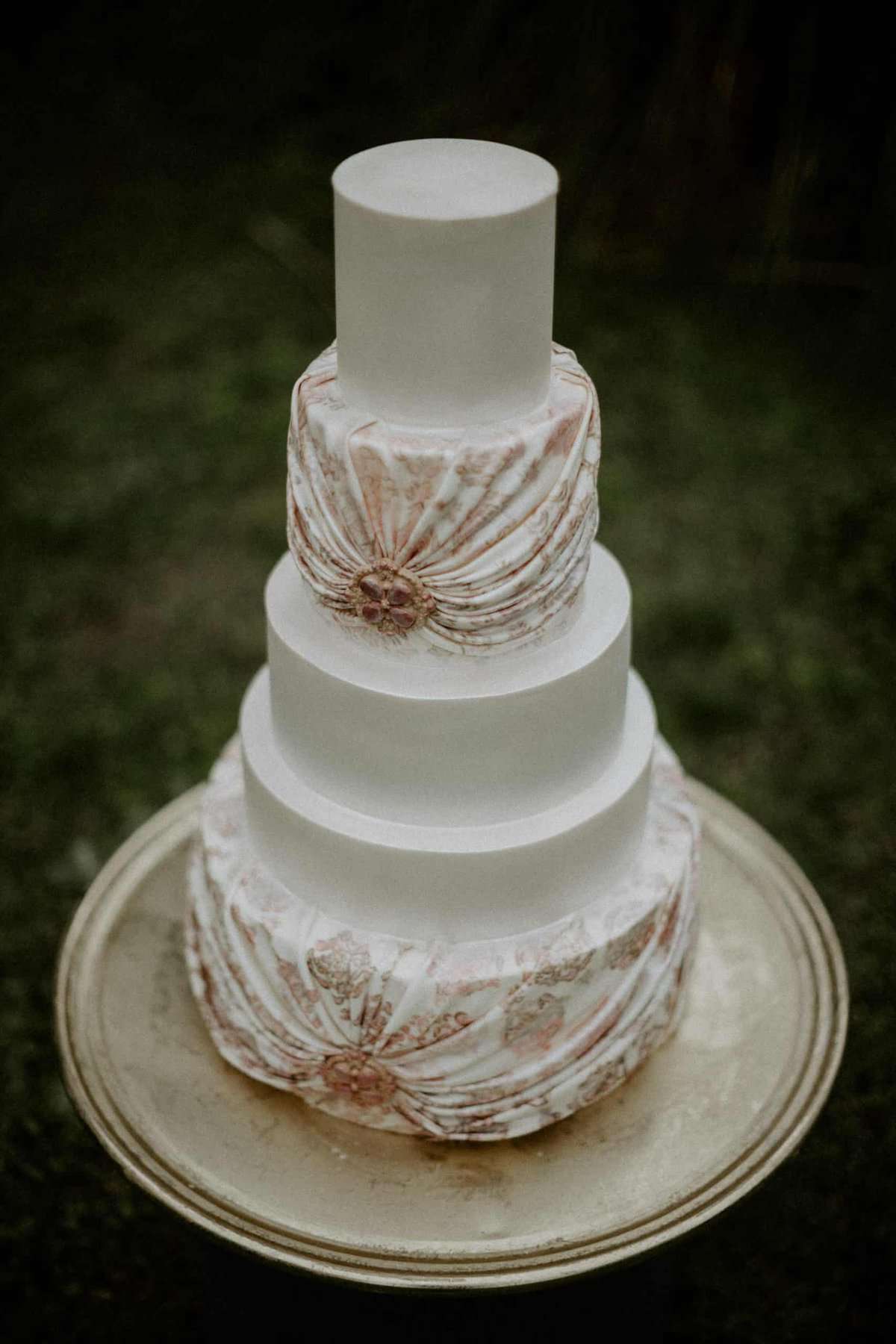 Romantic, vintage inspired wedding cake with draped fondant details