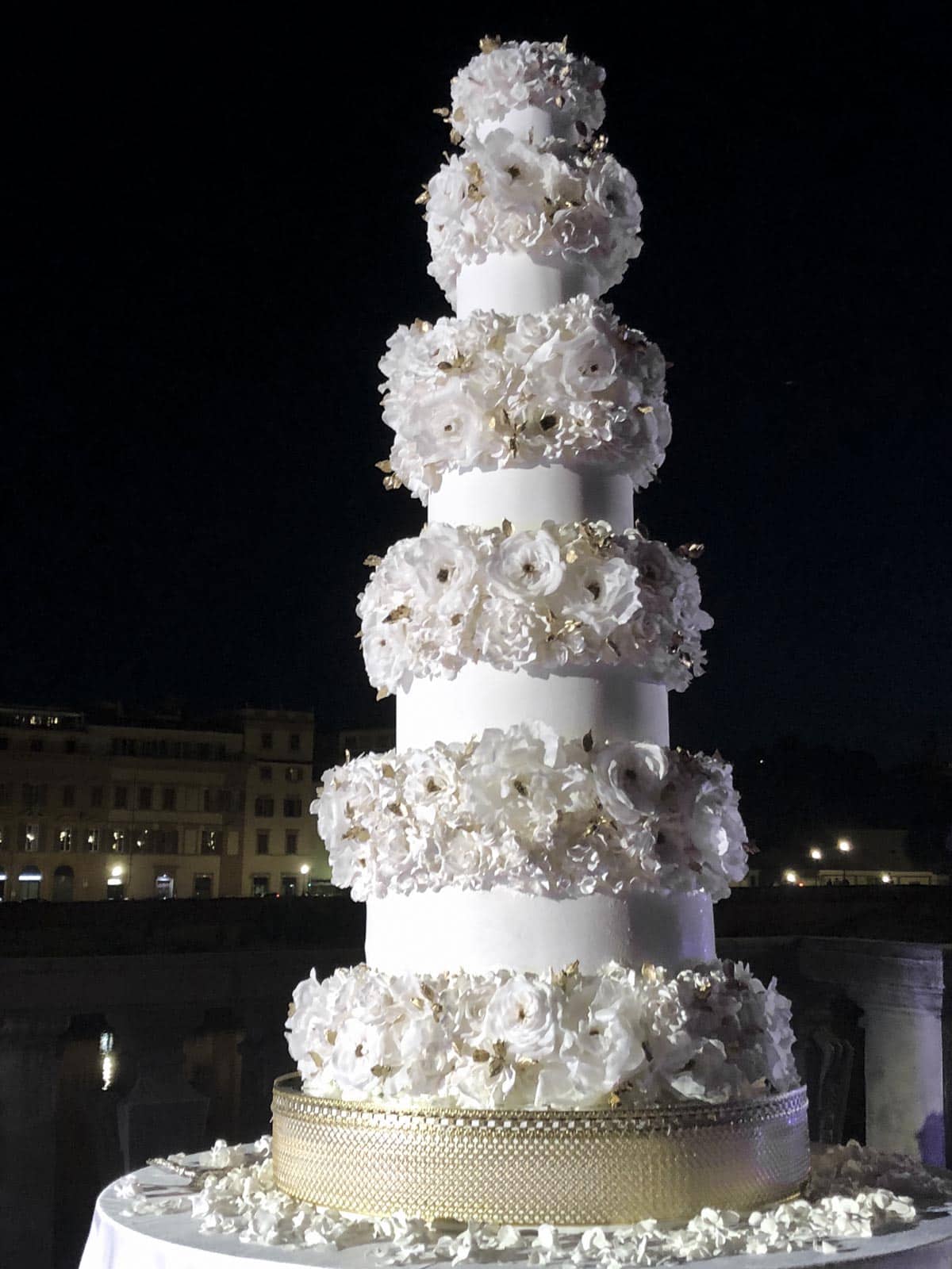 Magnificent white and gold wedding cake for Florence celebrity wedding, featured in Vogue